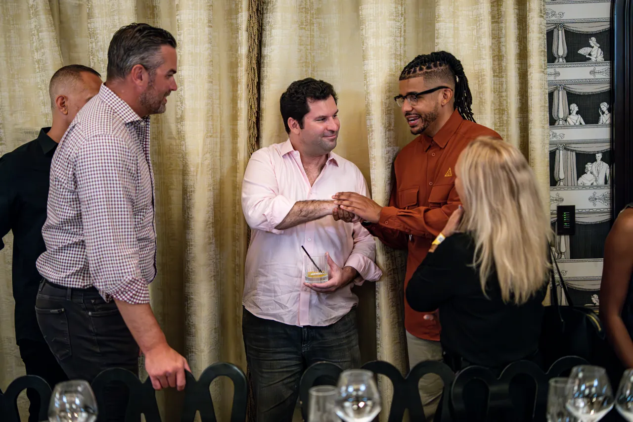 Guests chatting before a business dinner