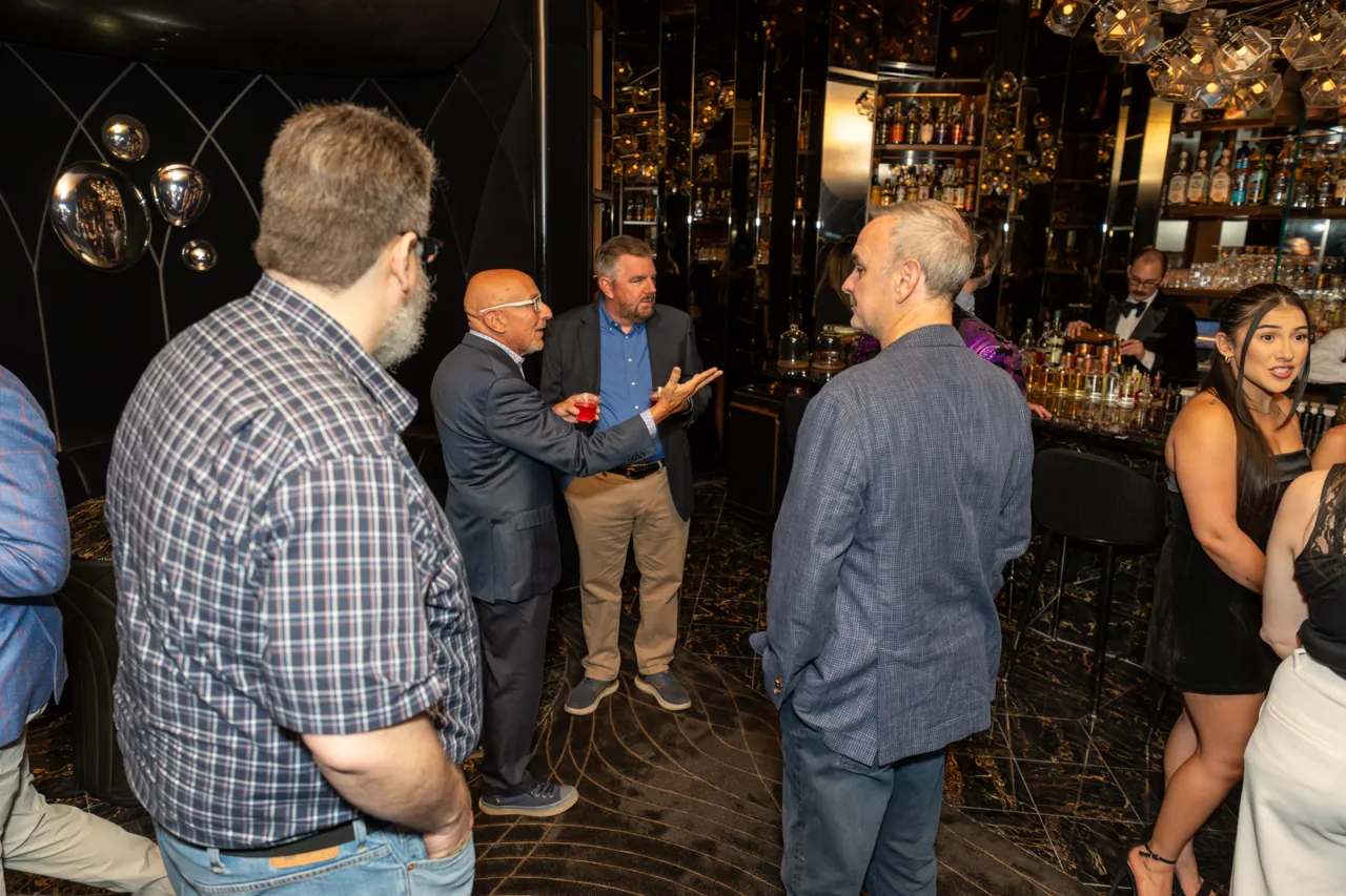 Guests exchanging ideas during a reception