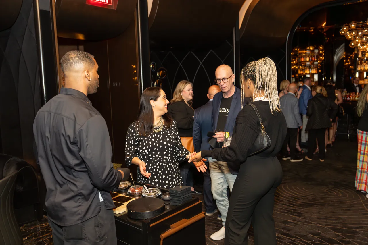 Guests mingling at a corporate reception