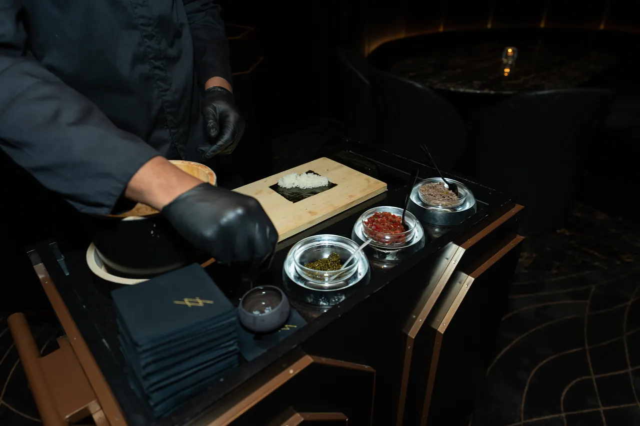 Bartender preparing drinks for guests