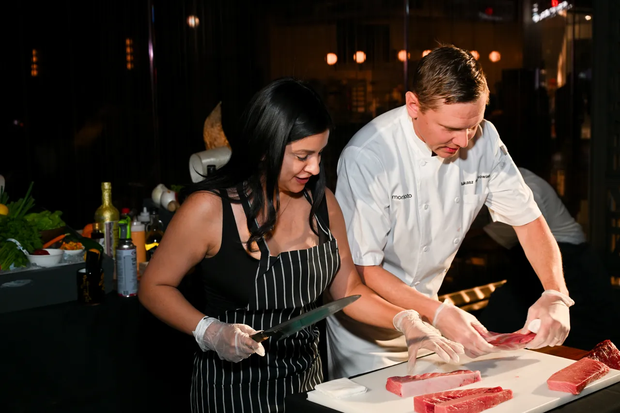 Guests preparing ingredients alongside the chefs — Morimoto, Las Vegas